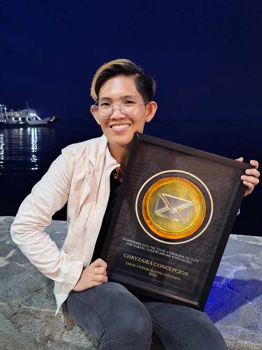 Chryzaika Concepcion with her Email Underground Elite plaque