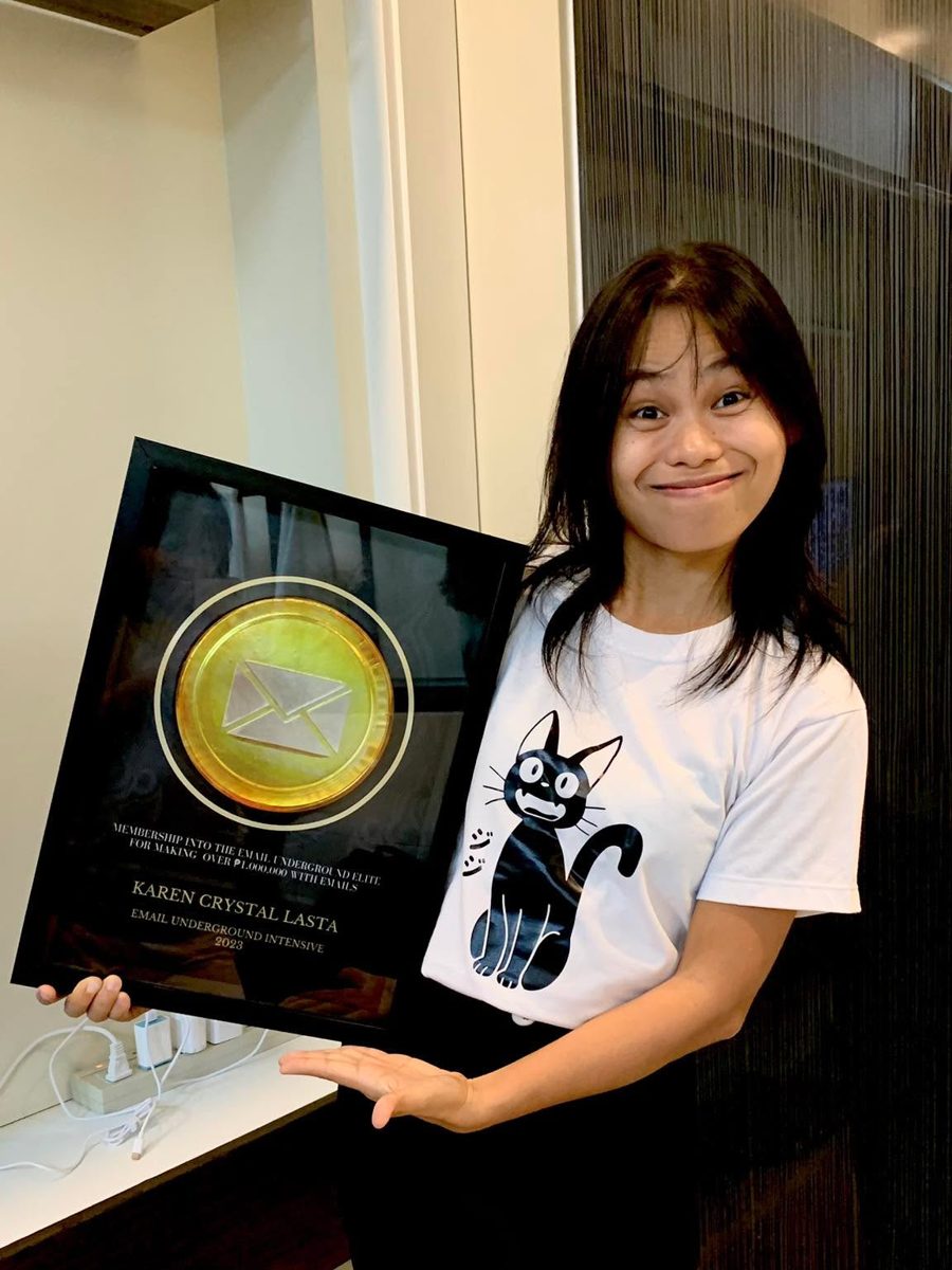 Karen Crystal Lasta with her Email Underground Elite plaque
